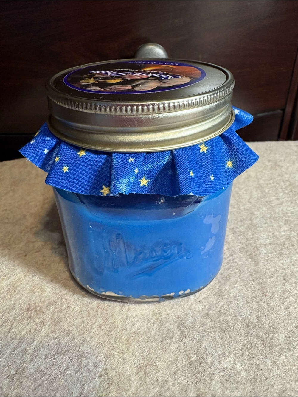 Sugar Lum-Blue Mason Jar Candle with Star-Print Fabric Accent